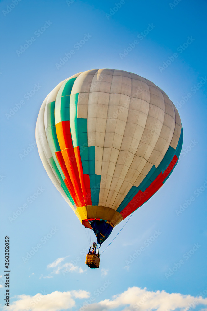Obraz premium Colored hot air balloons in the sky