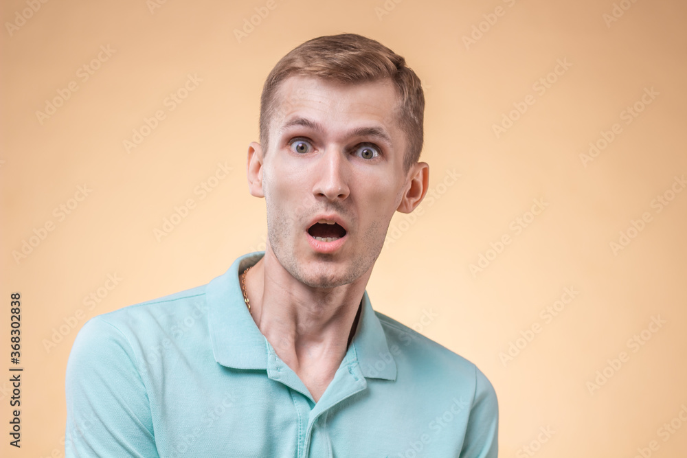 A man with bulging eyes is very surprised A man with bulging eyes is very surprised