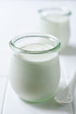 Natural organic yogurt in a vintage glass jar.