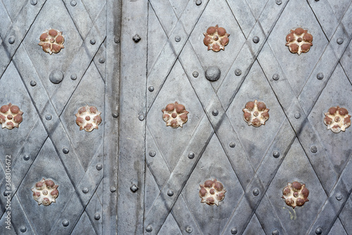 Ornate exterior door decorations in Prague, Czech Republic.
