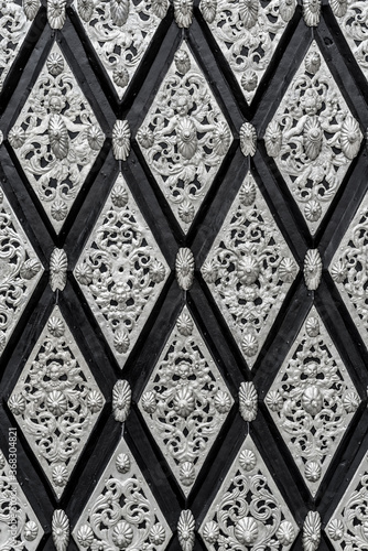 Ornate exterior door decorations in Prague, Czech Republic.