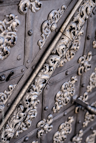 Ornate exterior door decorations in Prague, Czech Republic.