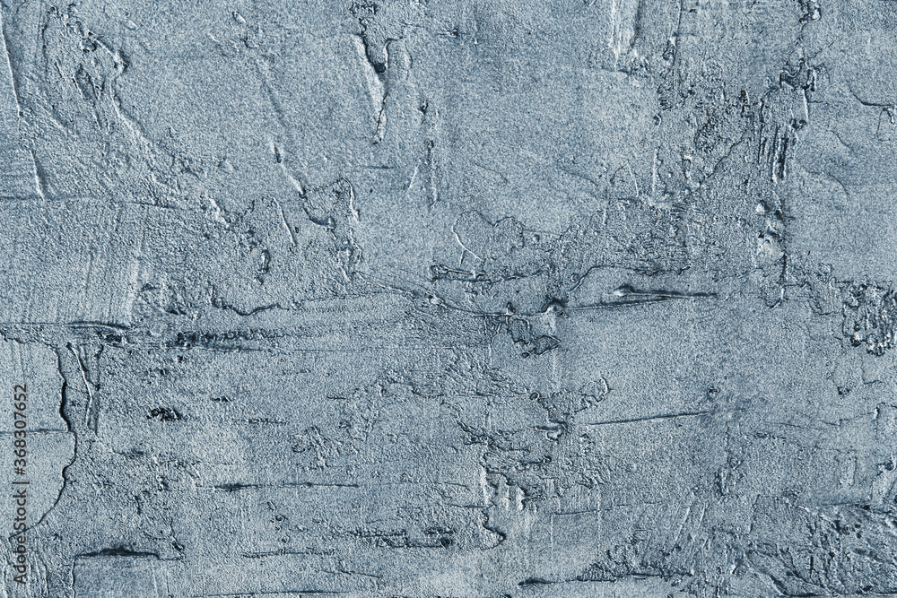 Obraz premium Abstract creative background of chaotic strokes of old cracked paint on concrete wall. Old surface with traces of paint, weathered, scratches and cracks for design