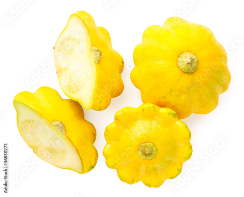Group of yellow squash whole and half on a white background, isolated. The view from top