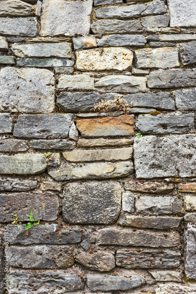 Obraz premium Wall built of natural stone. Can be used as background. Great background or texture.