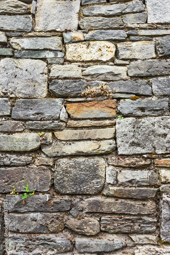 Wall built of natural stone. Can be used as background. Great background or texture.