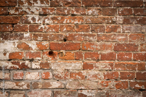 brick red wall. background of a old brick house.