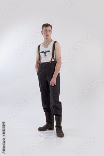 Male actor reenactor in historical military uniform as an officer of the German Army during World War II