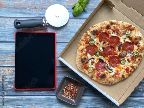 pizza on a wooden table
