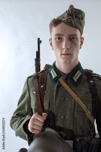 Male actor reenactor in historical uniform as an officer of the German Army during World War II photo