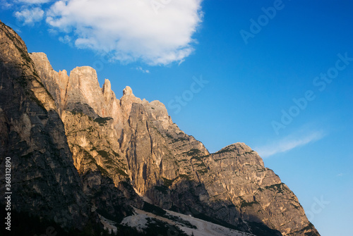 mountains against a bright sky, Dolomites Italy © n_fransua