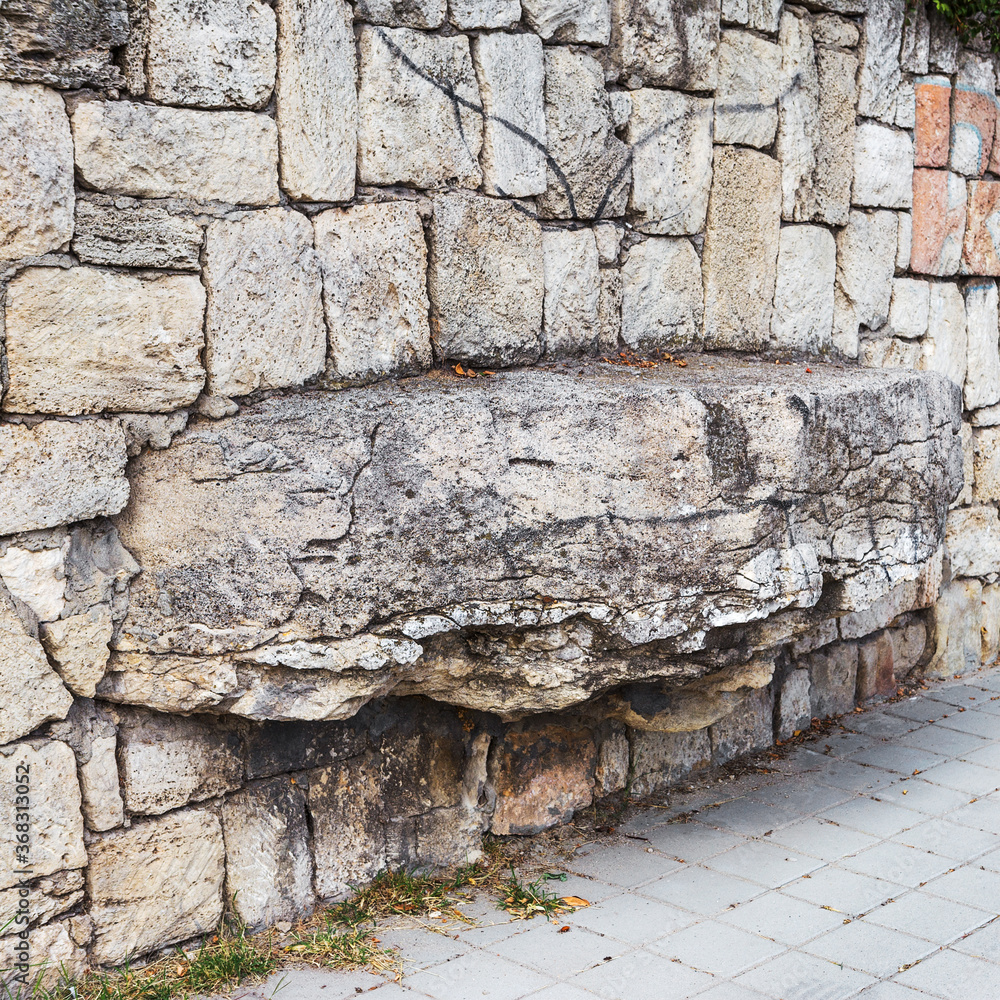 Naklejka premium Wall built of natural stone. Can be used as background. Great background or texture.