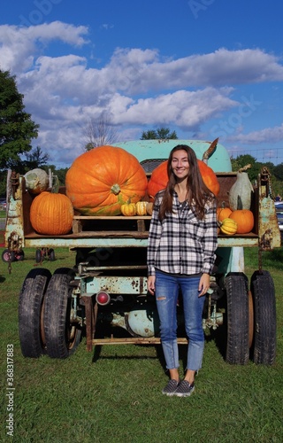 girl with pumpkins