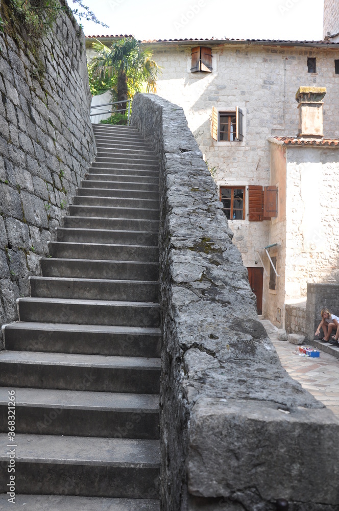 Ancient streets of the city of Kator in Montenegro .