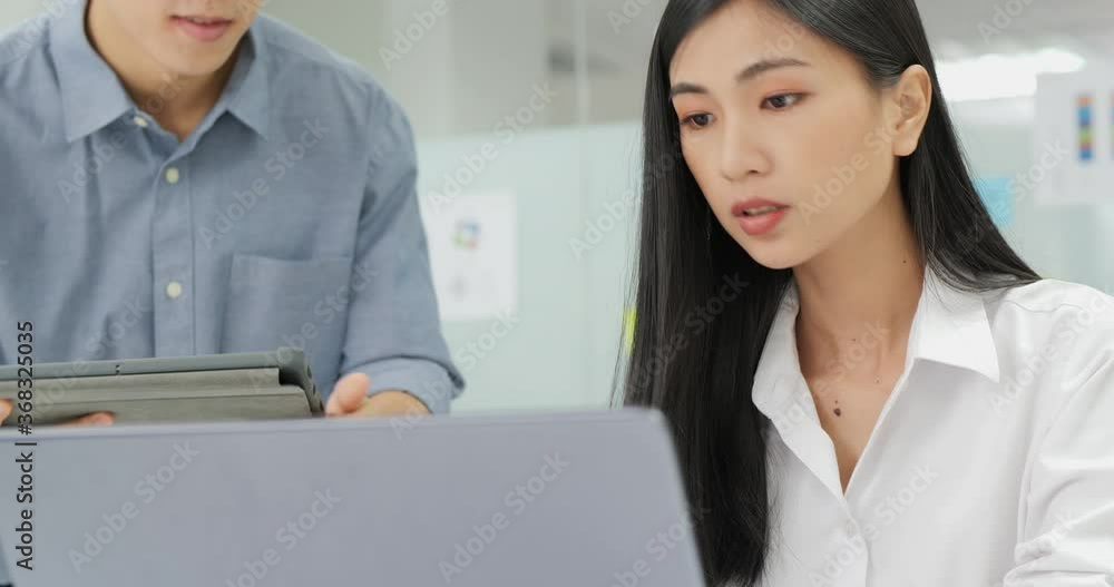 Business woman working with team at office. They Discuss about Business Data. Leadership, Successful, Teamwork and Business concept. Business woman working with team at office. They Discuss about Business Data. Leadership, Successful, Teamwork and Business concept.