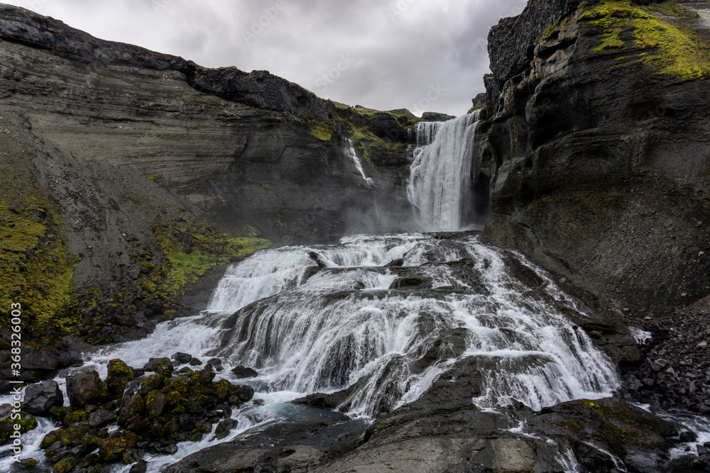 The Ófærufoss waterfall in the Eldgjá canyon, a volcanic canyon in the Vatnajokull National Park, deep inside the central highlands of Iceland. The Ófærufoss waterfall in the Eldgjá canyon, a volcanic canyon in the Vatnajokull National Park, deep inside the central highlands of Iceland.