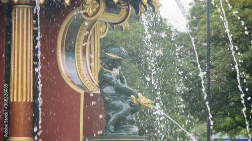 statuette in a water fountain