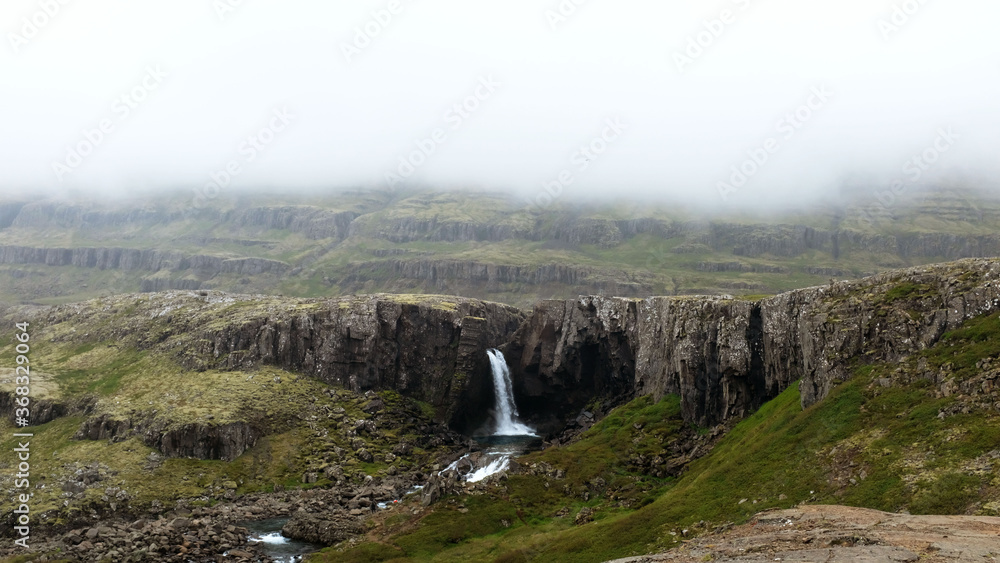 Folaldafoss Waterfall in the East Fjords in Iceland Photos | Adobe Stock