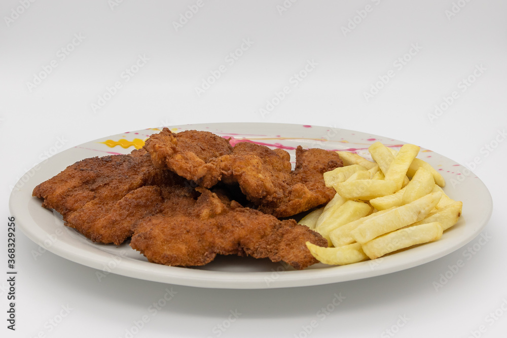 breaded pork chop with french fries