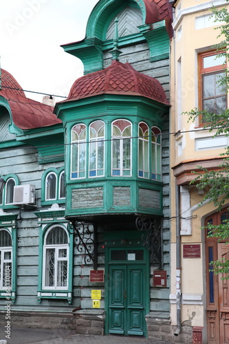 Obraz na płótnie Vintage wooden Ignatyeva's house with carved windows on Anokhin Street, 53, Chita city, Russia