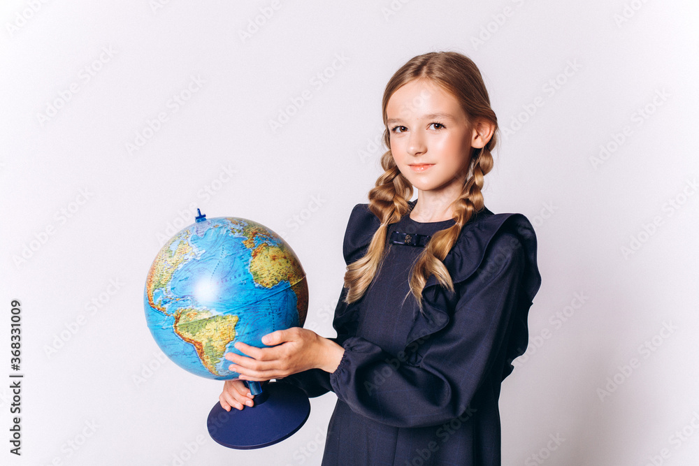 Back to school. Cute adorable caucasian blondie girl with glode in school uniform on white background