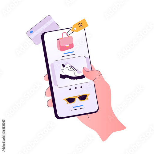 Online shopping concept. Hand holding smartphone. Ordering clothes in internet store