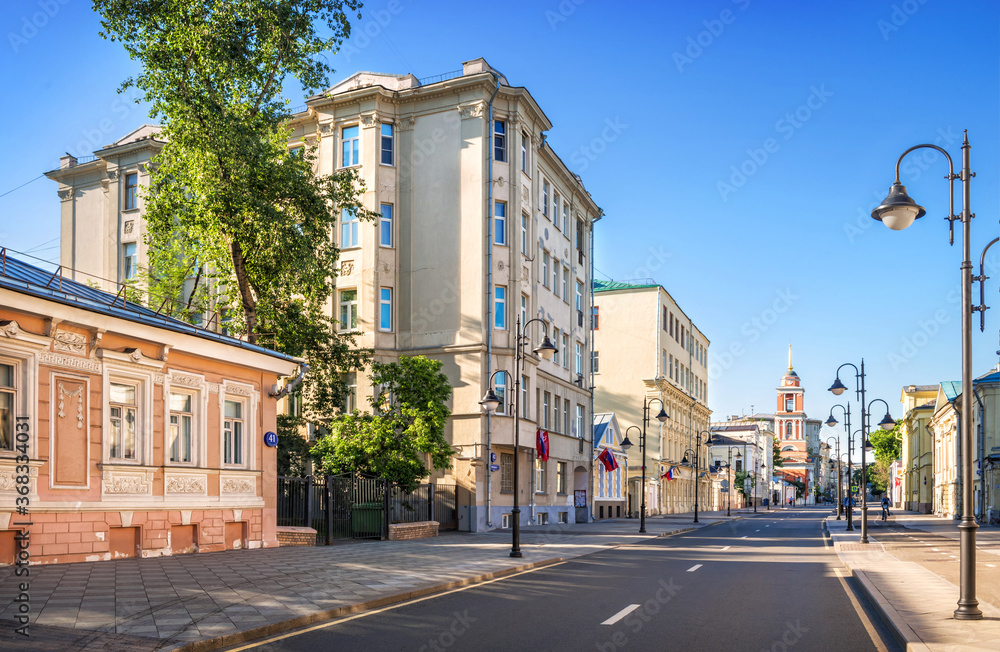 Ancient buildings and the bell tower of the Trinity Church on Pyatnitskaya Street in Moscow