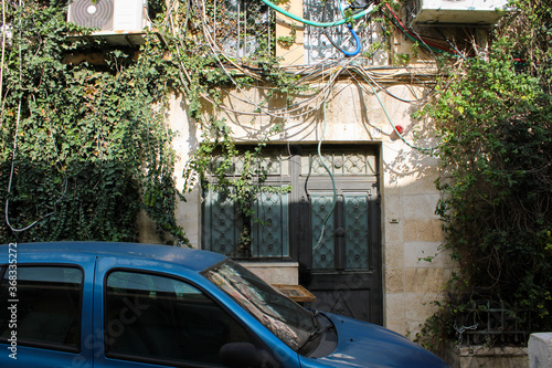 Wallpaper Mural car parked in a narrow street in old city Torontodigital.ca