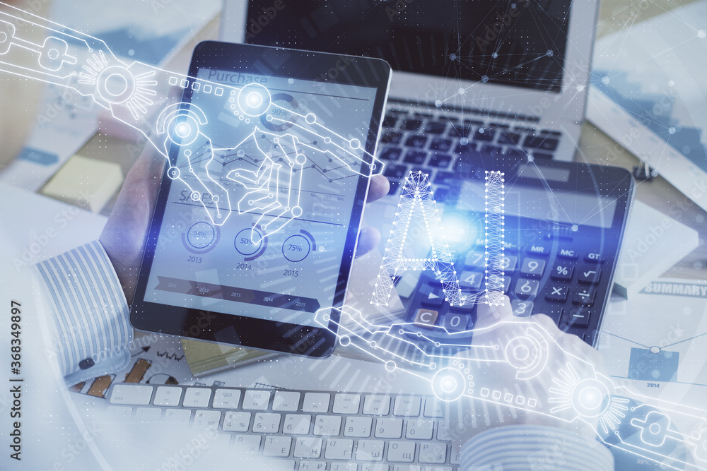 Double exposure of man's hand holding and using a digital device and data theme hologram drawing. Technology concept. Double exposure of man's hand holding and using a digital device and data theme hologram drawing. Technology concept.