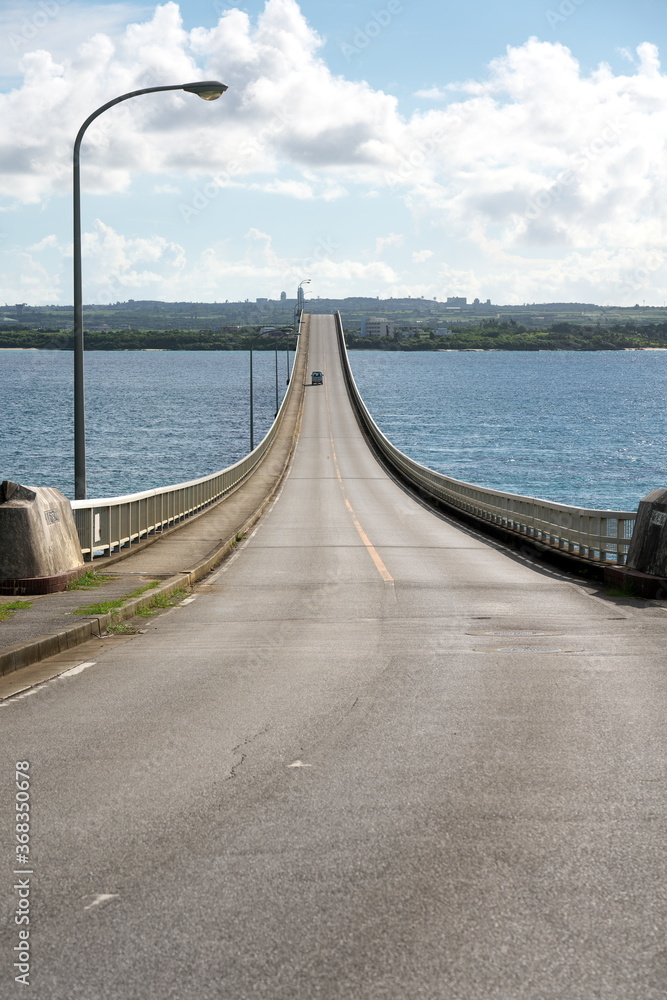 Okinawa,Japan-July 20, 2020: View of Kurima Bridge from Kurima island. Its length is almost 1 mile.
