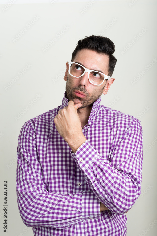 Obraz premium Portrait of handsome bearded hipster man with eyeglasses