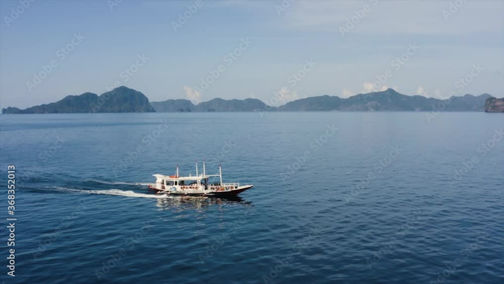 Aerial view of a boat in El Nido, Palawan, Philippines.