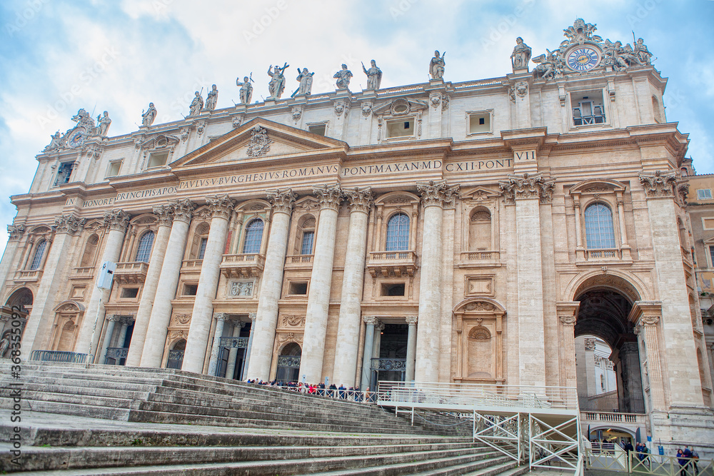 Largest church building in the world . Facade of St. Peter's Basilica in Vatican . Papal Basilica of Saint Peter  
