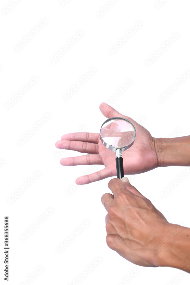 Look at the palm pattern with a magnifying glass Look at the palm pattern with a magnifying glass