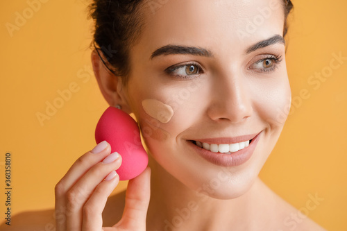 Beautiful young woman with ...