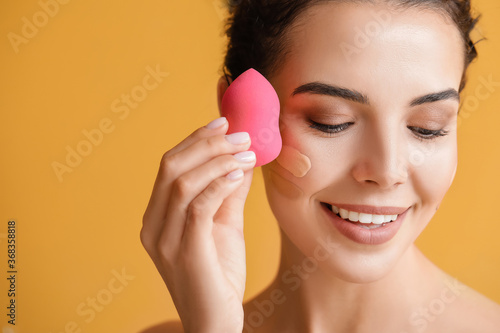 Beautiful young woman with ...