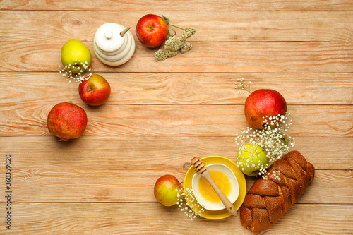 Composition for Rosh Hashanah  Jewish New Year  celebration on wooden background