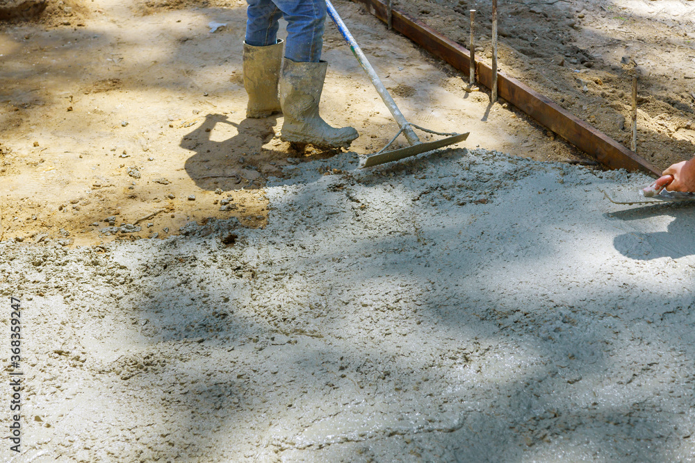 Construction of new sidewalks laying concrete cement Construction of new sidewalks laying concrete cement