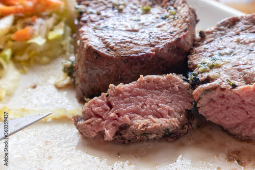 medium rare grilled beef steak closeup