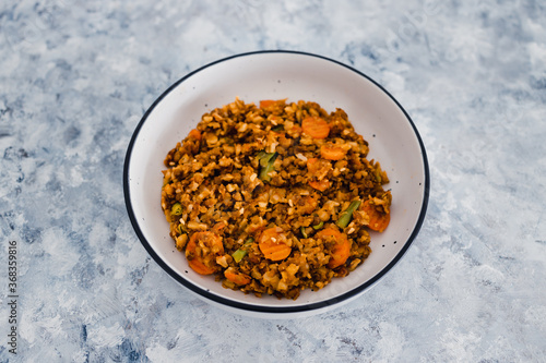 plant-based food, vegan potato and lentils mash with garden veggies