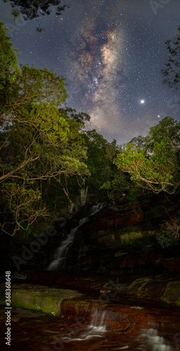milky way over a waterfall © Andrew
