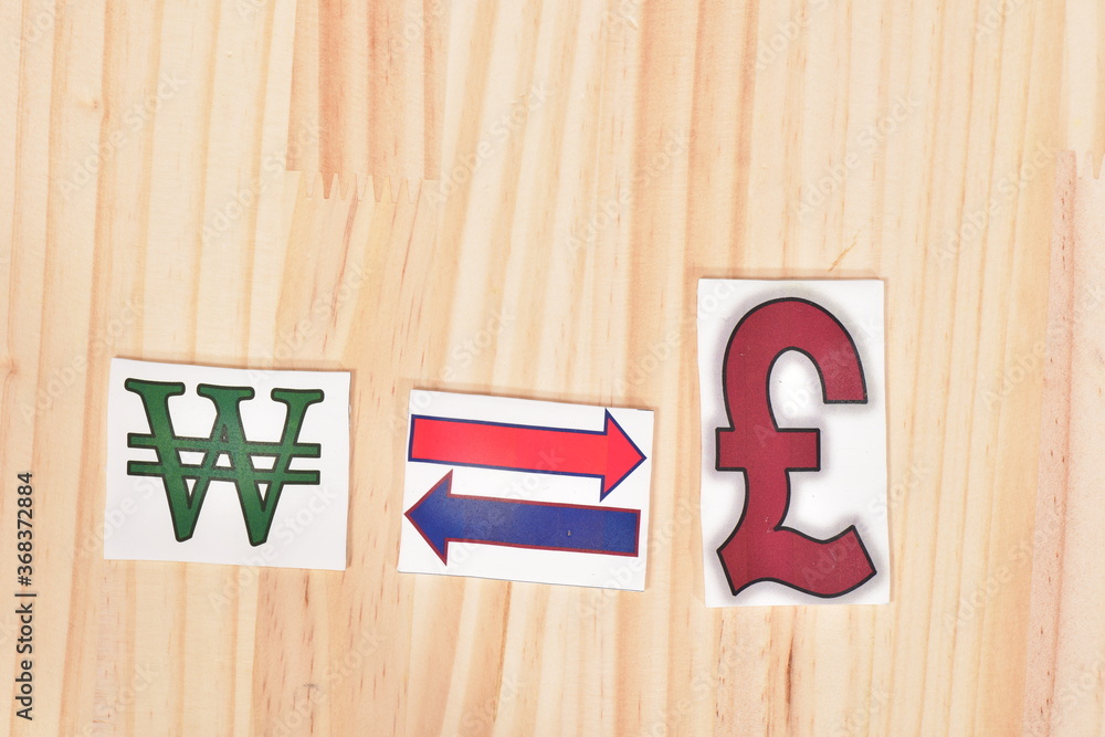 ウォンとポンドと矢印のカード Stock Photo Adobe Stock