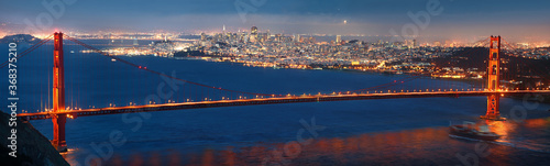 Golden Gate Bridge in Blue Hour with Cargo Ship