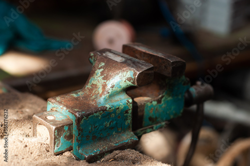Fototapeta Naklejka Na Ścianę i Meble -  Iron working vice locksmith rotary in the garage