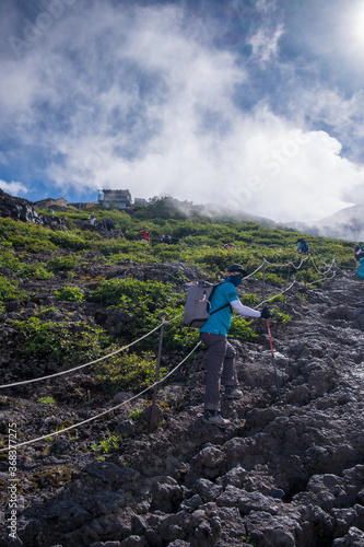 Yamanashi, Japan - August 24, 2017: Mt. Fuji climbing. A photo of people are climbing to the top of mountain