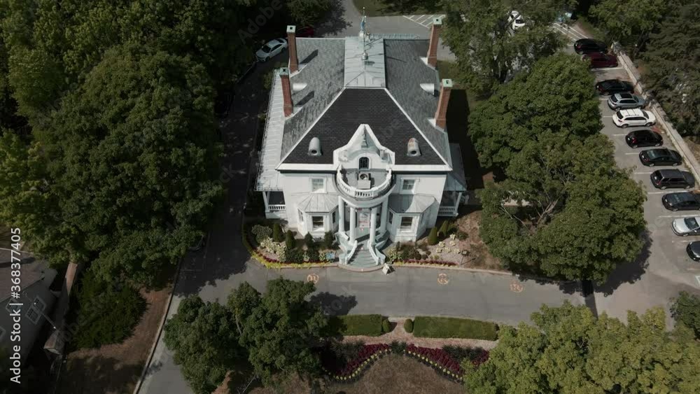 Exterior Of The Manoir Globensky And The peaceful Town Of Saint-Eustache, Quebec, Canada. House Of Culture And Heritage. - aerial drone Exterior Of The Manoir Globensky And The peaceful Town Of Saint-Eustache, Quebec, Canada. House Of Culture And Heritage. - aerial drone
