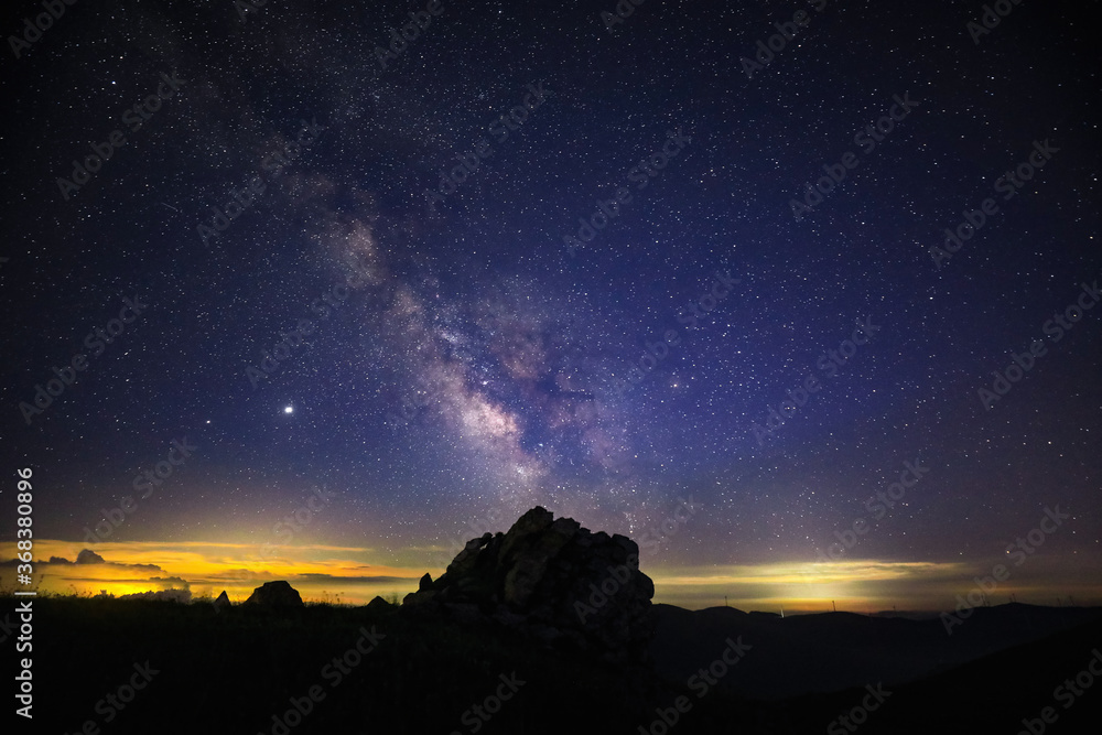 Watch the stars and the Milky way from the top of the mountain.