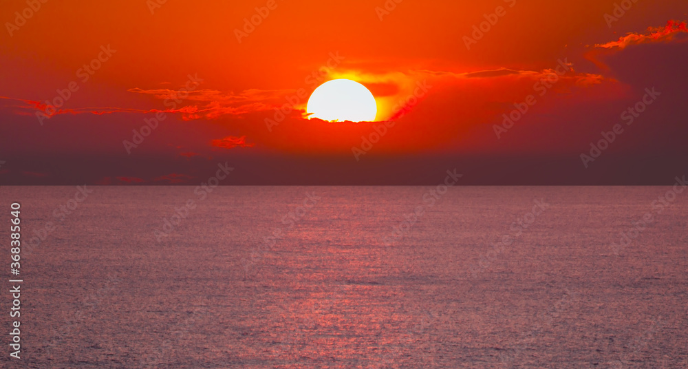 Spectacular red sunset over the sea, coast of Alanya Turkey