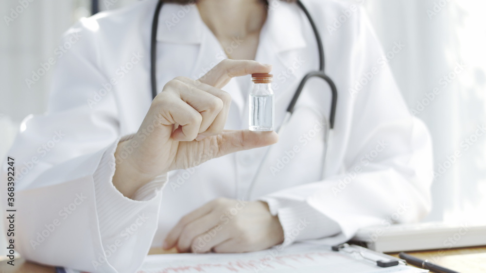 Vaccine bottles placed on the doctor's desk. Vaccine bottles placed on the doctor's desk.