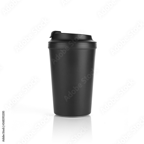 Blank Classic black colour anti slip suction coffee mug isolated on white background. Front view with reflection. Suitable for hot & cold beverage. For branding, mock up & advertisement. Studio Shoot.